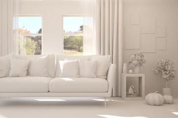 Stylish room in white color with sofa and autumn landscape in window. Scandinavian interior design. 3D illustration