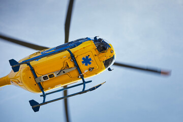 Flying helicopter of emergency medical service. Themes rescue, help and hope.