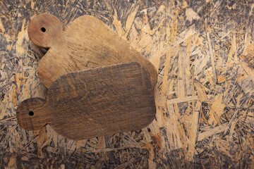 Wood cutting board on wooden osb  background top table