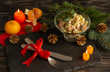 Traditional Russian New Year salad Olivier, New Year's or Christmas salad serving