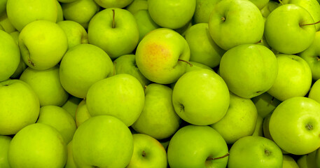 A lot of green apple, texture background. Pile of fresh ripe apple pattern, high quality photo