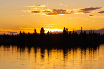 Fototapeta na wymiar A Colourful Sunset at Astotin Lake, Elk Island National Park