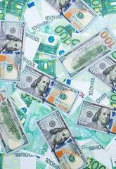Money US dollars and Euro banknotes, different monetary bills, a lot of different money finance banknotes of different countries