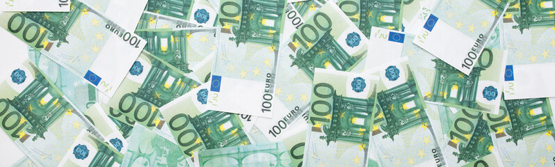 Banknotes 100 euros beautifully laid out. Euro euro money. European Union banking, financial savings.