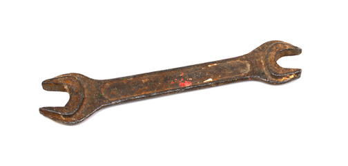 Old rusty wrench on a white background