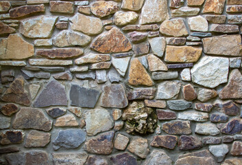 Texture of a stone wall. Old castle stone wall texture background