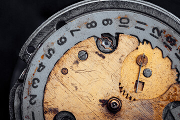 The dial of an old mechanical watch is a close-up. Macro photography with a large depth of field