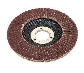 Sandpaper wheel for stripping metal on a white background