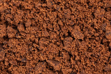 Muscovado sugar background. Barbados sugar, khandsari or khand. Top view.