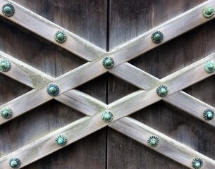 Vintage Japanese wooden door decorated with copper parts with blue green patina. Exterior design concept, art