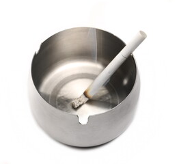Metal ashtray with lit and smoke cigarette isolated on white  