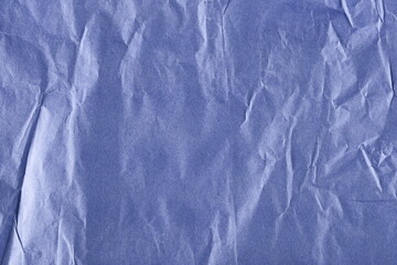 Wrinkly blank blue shopping paper bag texture and background 