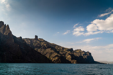 The Crimean Peninsula. July 21, 2021. Picturesque view of the high cliffs at Cape Karagach from the Black Sea.
