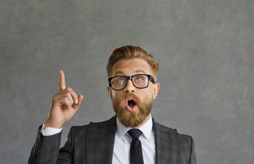 Headshot emotional handsome guy, office worker, employee entrepreneur in smart jacket, necktie and...