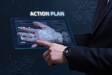 Business, Technology, Internet and network concept. Financial Graph. Stock Market chart. Young businessman working on a virtual screen of the future and sees the inscription: Action plan