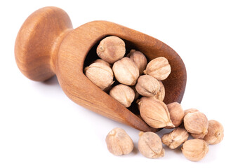 Heap of white cardamom pods in wooden scoop, isolated on white background. Kapulaga Jawa or Javanese cardamom. Amomum kepulaga. Clipping path.