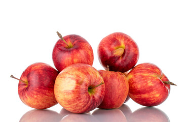 Several juicy red apples, close-up isolated on white.