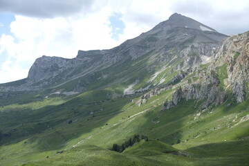 Mountain landscape with green valleys.
Mountain landscape with green valleys. Caucasian State Natural Biosphere Reserve named after Kh.G. Shaposhnikov. Oshten mountain slopes.