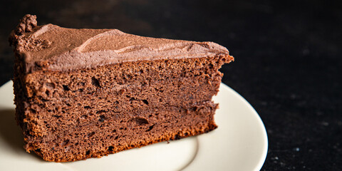 chocolate cake piece cocoa holiday treat sponge cake brown cream sweet dessert meal snack on the table copy space food background rustic 