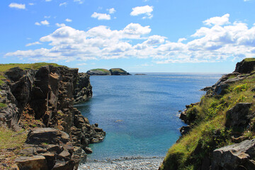 Fototapeta na wymiar View of the rugged coastline along Elliston Newfoundland, and the Atlantic Ocean.