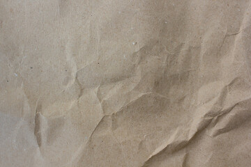 texure of beige crumpled wrapping paper for background