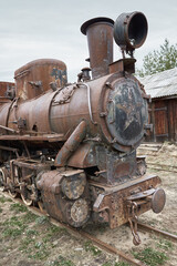 Obraz na płótnie Canvas Old steam locomotive on the railway