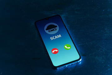 Incoming call from scammer. Scam call on phone. - obrazy, fototapety, plakaty