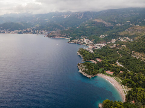 Aerial view of a beautiful coastline at sunset along the Mediterranean Sea in Balkan Peninsula near Budva, Montenegro.