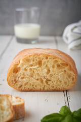 ciabatta is an Italian white bread made from wheat flour water salt yeast olive oil on white background