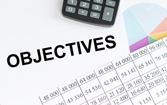 Objective text written on white paper - Business Concept