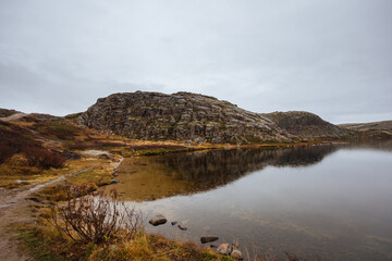 Mountain lake in the vicinity of Teriberka at sunrise