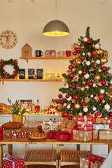Christmas kitchen. Red and gold decor christmas tree background. New Year celebration. Merry Christmas and Happy New Year.