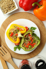 Concept of tasty food with stuffed pepper on white background