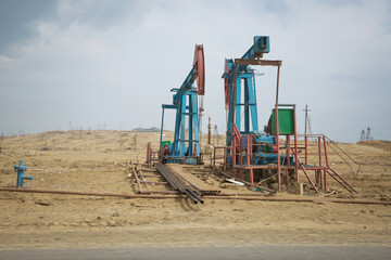 Land oil drilling rig blue sky .Land rig during the drilling operation . Oil and gas drilling rig...