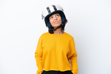Woman with a motorcycle helmet and looking up