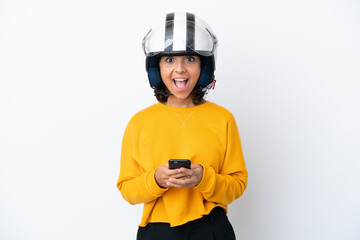 Woman with a motorcycle helmet surprised and sending a message