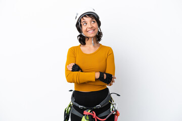 Fototapeta na wymiar Young woman rock-climber woman isolated on white background looking up while smiling