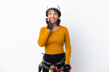 Young woman rock-climber woman isolated on white background with surprise and shocked facial expression