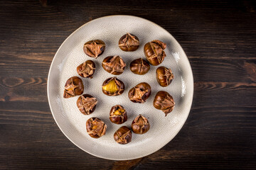 Roasted chestnuts on a plate