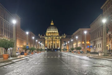 Deurstickers The illuminated St. Peter's dome in Vatican City late evening after a short rainfall. © Stefan