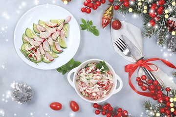Fototapeta na wymiar Christmas new year dishes, detox diet concept, traditional festive cucumber tomato and radish vegetable salad, healthy lifestyle and healthy eating concept, selective focus