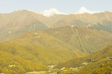 Fototapeta premium Russia, Krasnodar Territory. Sochi. Rosa Khutor Mountain Resort. The peaks of the Aibga mountain range. 