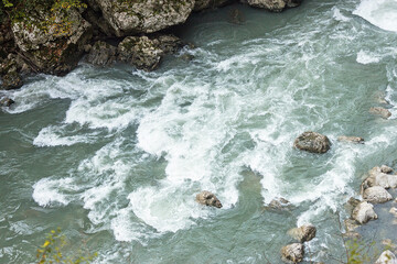 Russia, Krasnodar Territory. Sochi. A rocky section of the Old Krasnopolyansky highway. Mountain river Mzymta.
