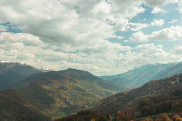 Fototapeta premium Russia, Krasnodar Territory. Sochi. Rosa Khutor Mountain Resort. The peaks of the Aibga mountain range. 