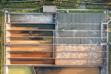 Top aerial view of purification tanks of modern wastewater treatment plant