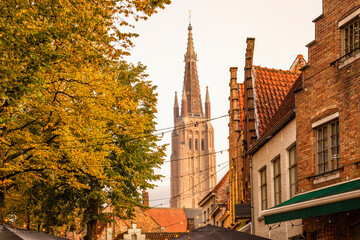 Tower of the Church of Our Lady in Bruges in autumn