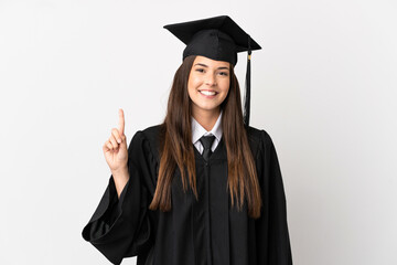 Teenager Brazilian university graduate over isolated white background pointing up a great idea