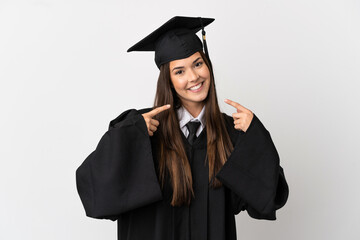 Teenager Brazilian university graduate over isolated white background giving a thumbs up gesture