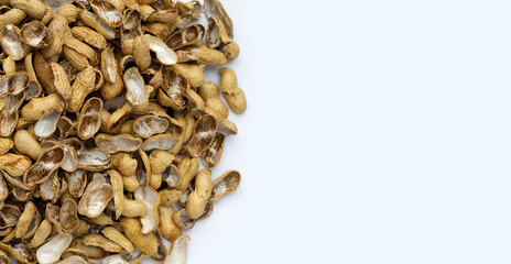 Peanut shells on white background.