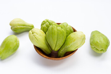 Fresh chayote fruit on white background.